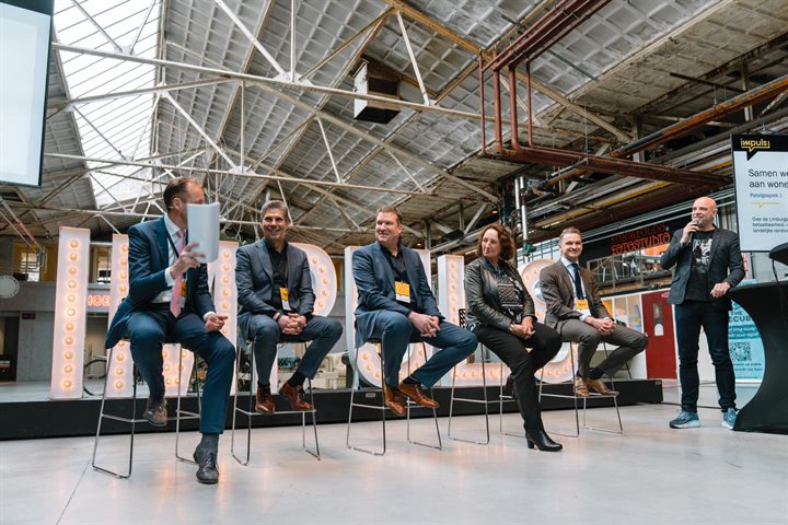 Panelgesprek met bestuurders tijdens WoonIMPULS2026
